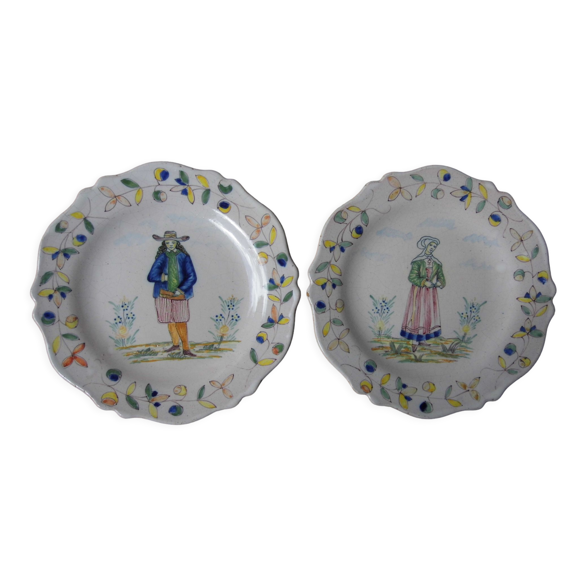 Malicorne earthenware plates, late nineteenth century, Breton décor.