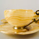 Set of 4 marble and brass espresso cups and saucers