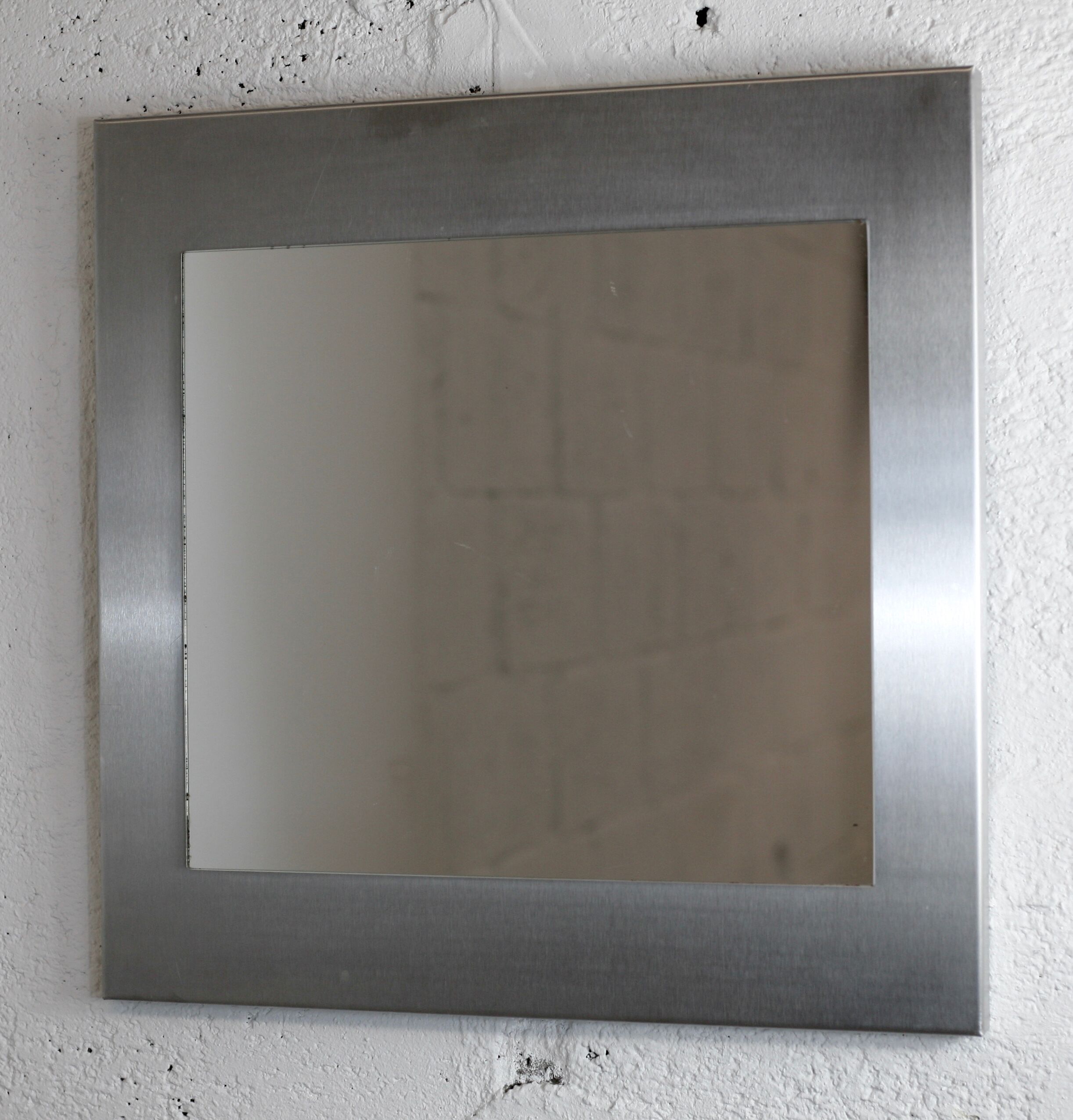 Mirror "space age". Stainless steel. France, circa 1970