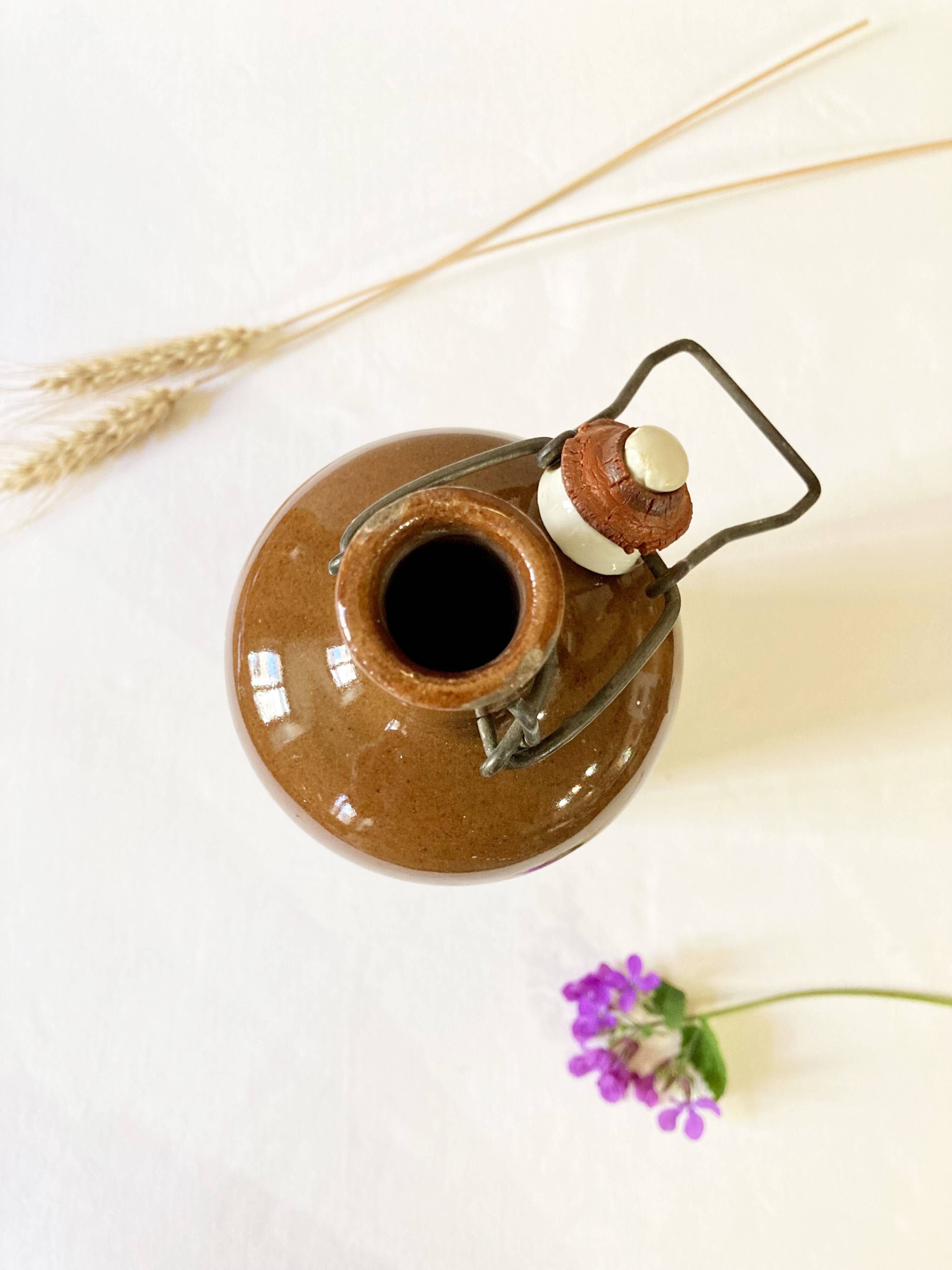 Bottle / hot water bottle in brown enamelled stoneware