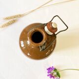 Bouteille / bouillotte en grès émaillé marron