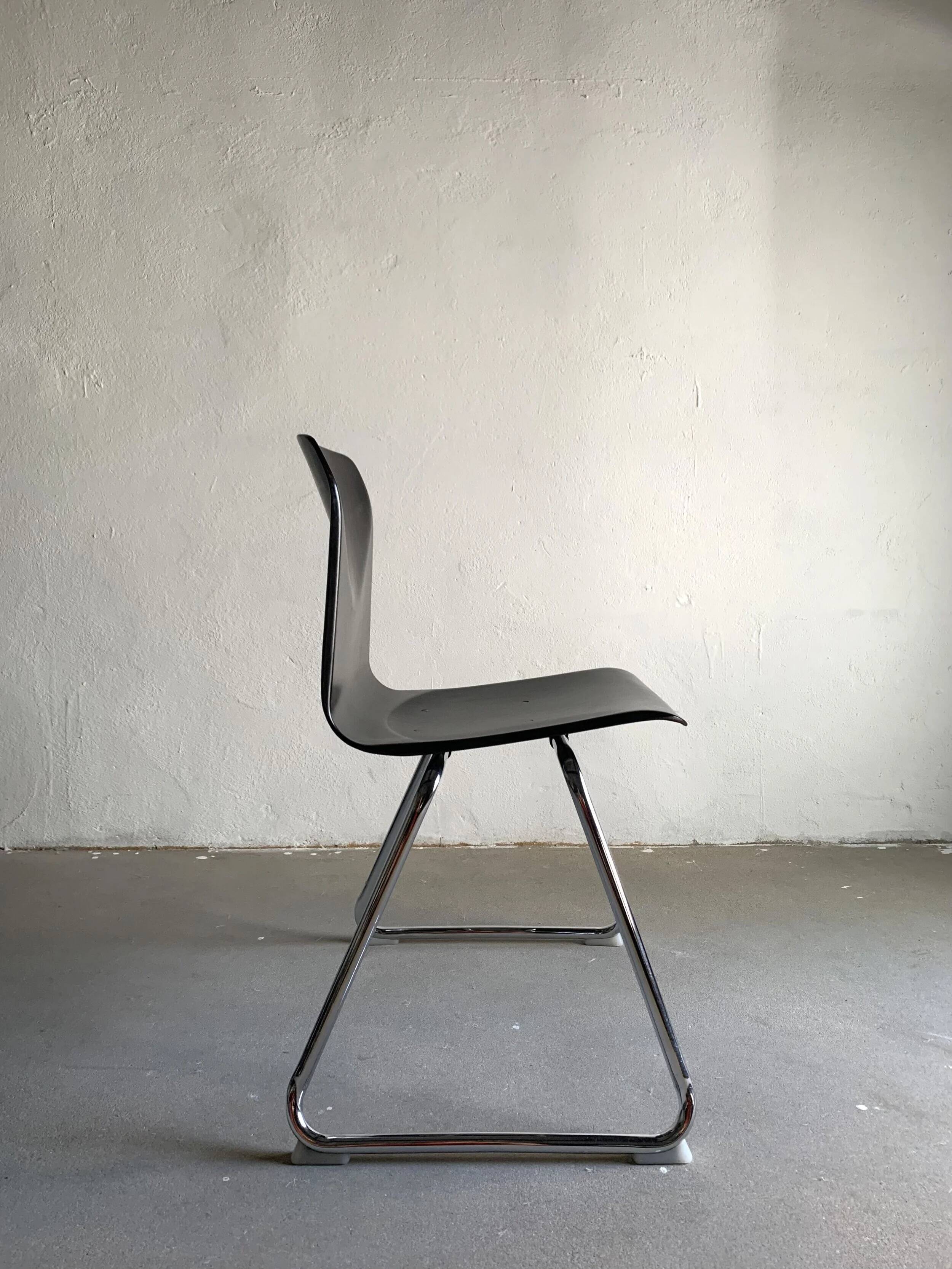 7 chaises de salle à manger empilables en acier tubulaire Pagholtz | Allemagne de l'Ouest | Années 1960