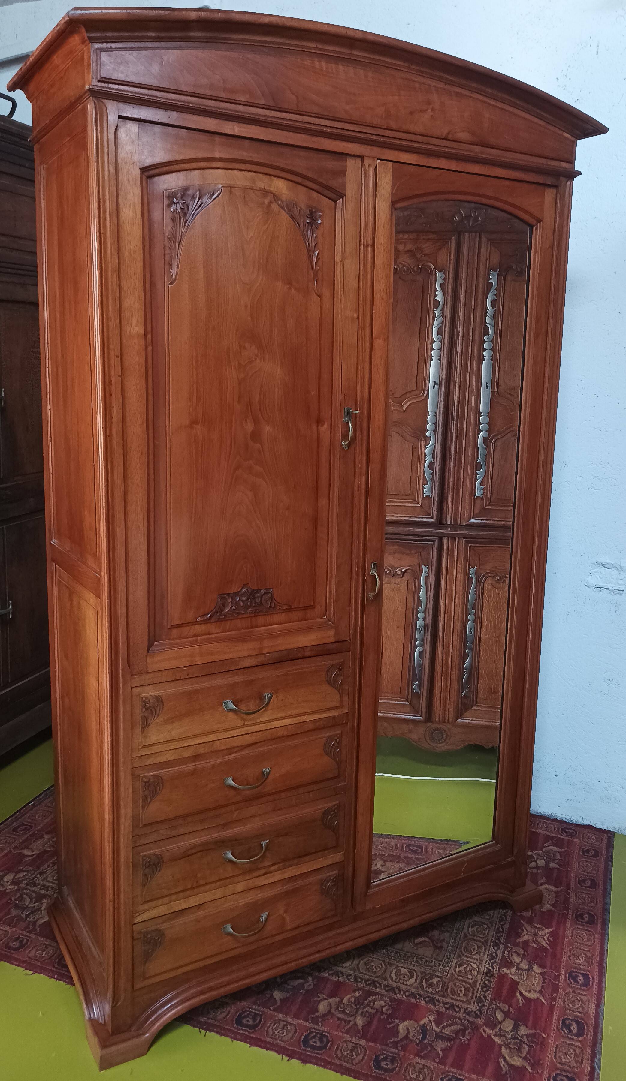Art Nouveau carved walnut cabinet