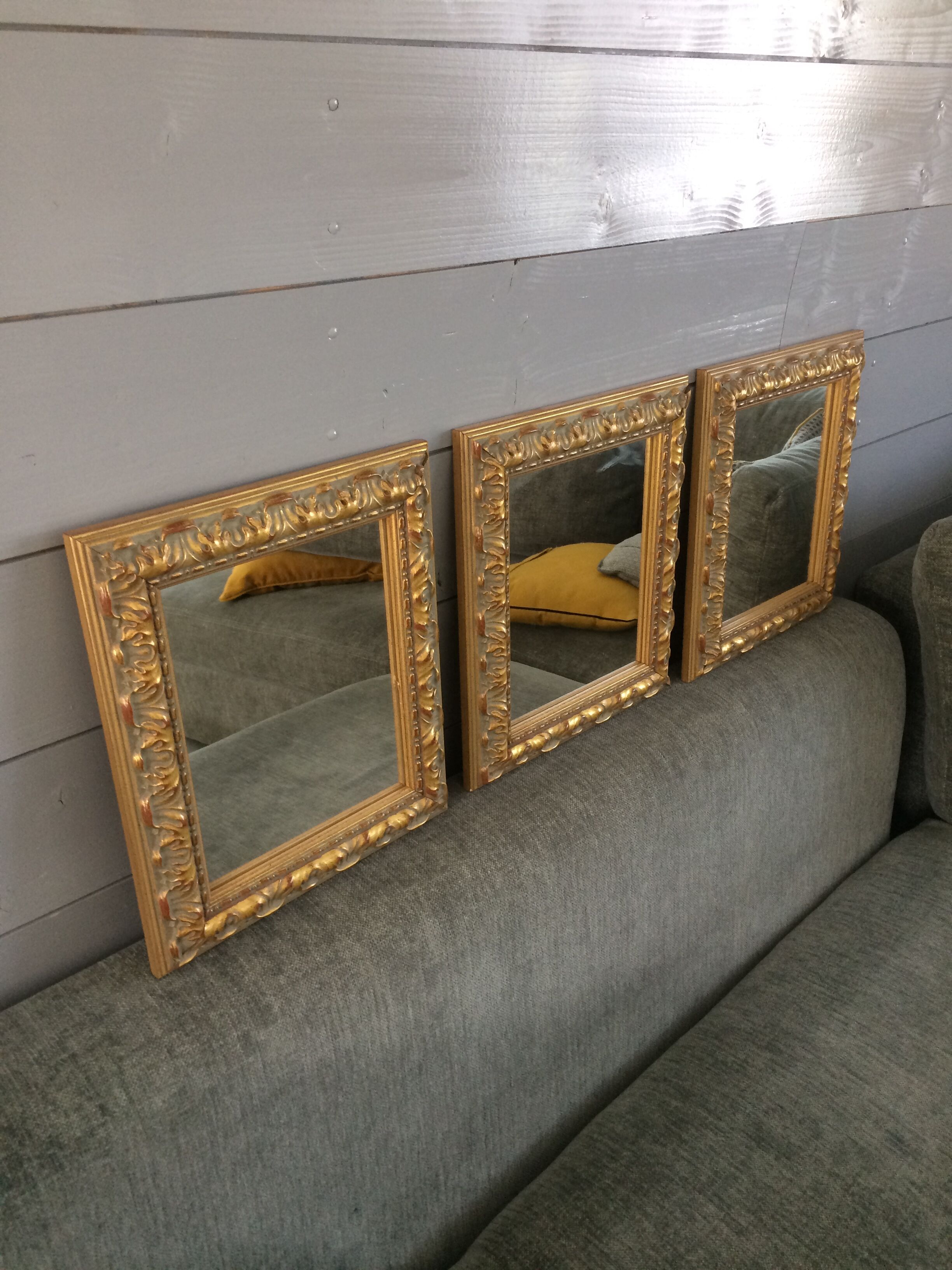 Triptych of ancient gilded mirrors