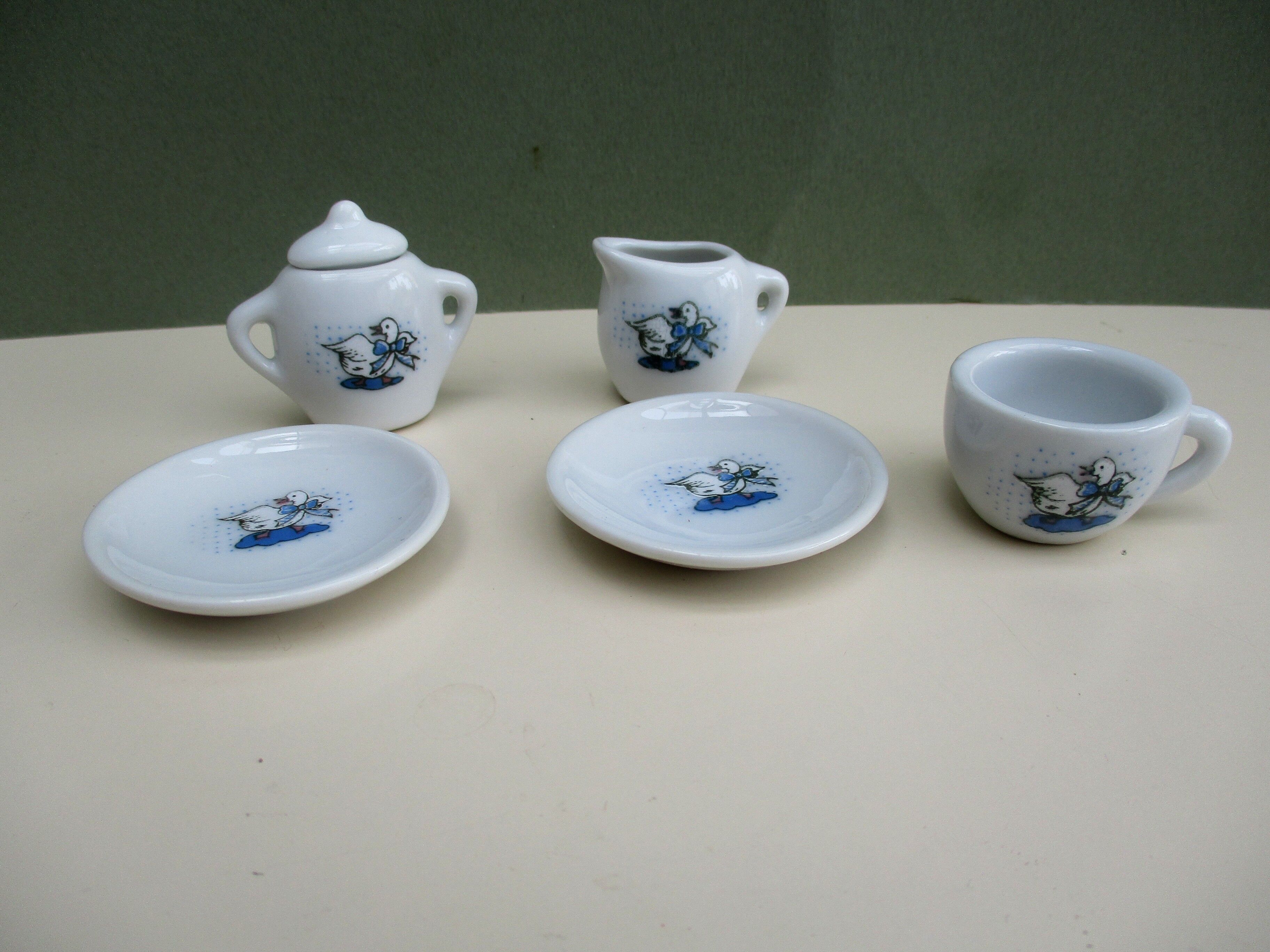 Tete à tete  « martine »  en porcelaine pour enfant pièces de dinette