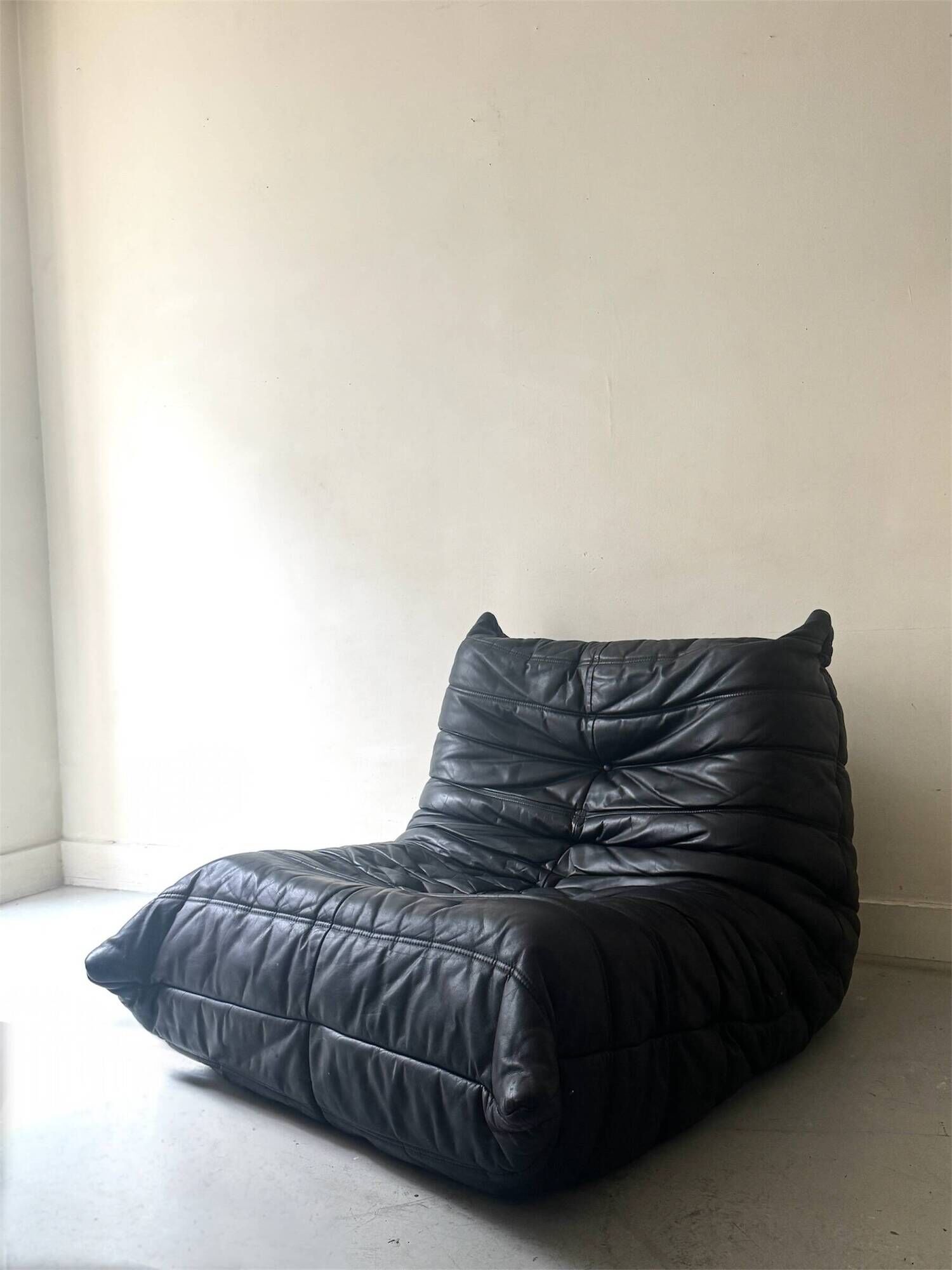 Black leather Togo armchair by M. Ducaroy for Ligne Roset