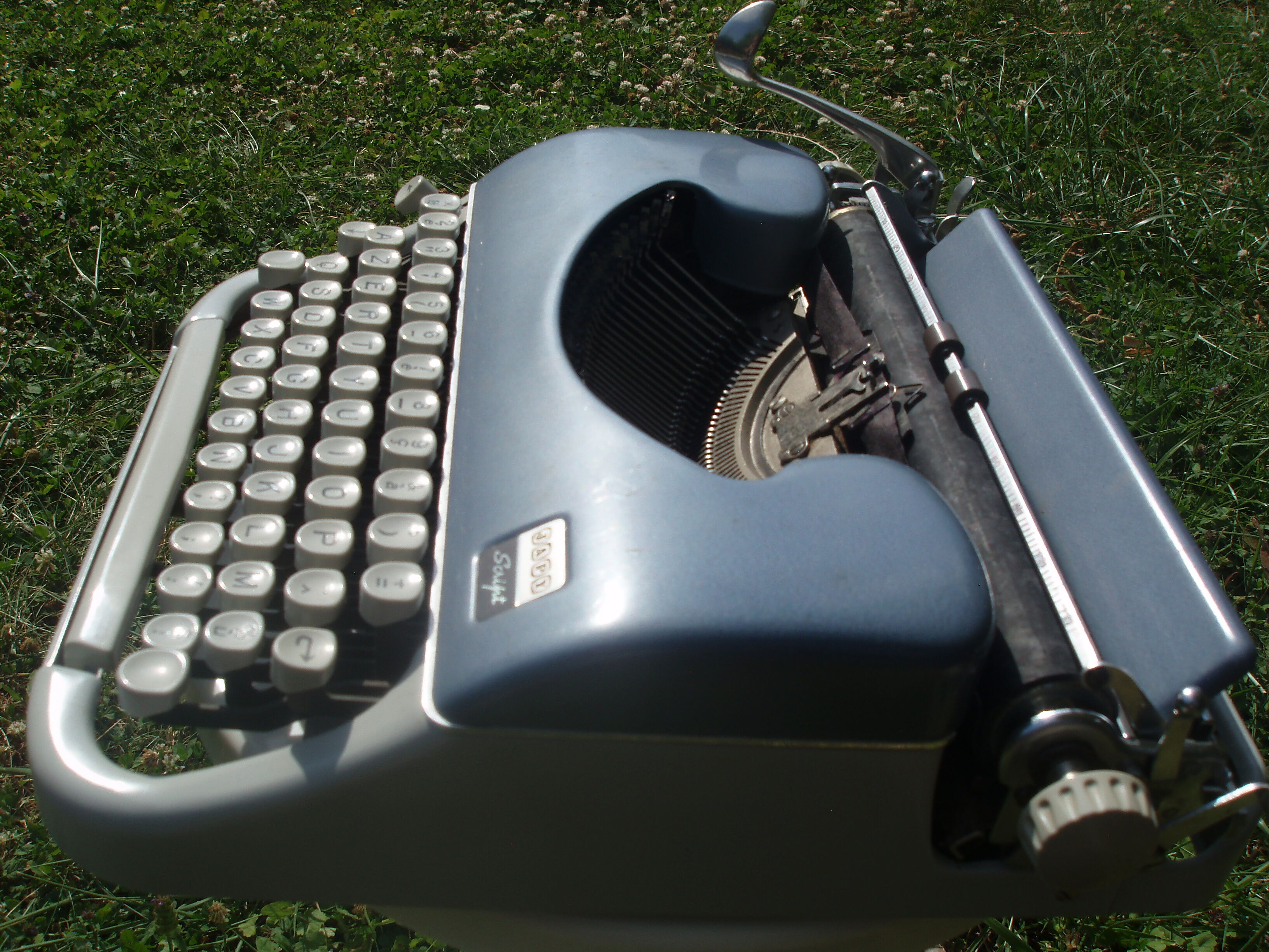 Typewriter blue japy script  with manual and carrying case