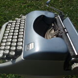 Typewriter blue japy script  with manual and carrying case