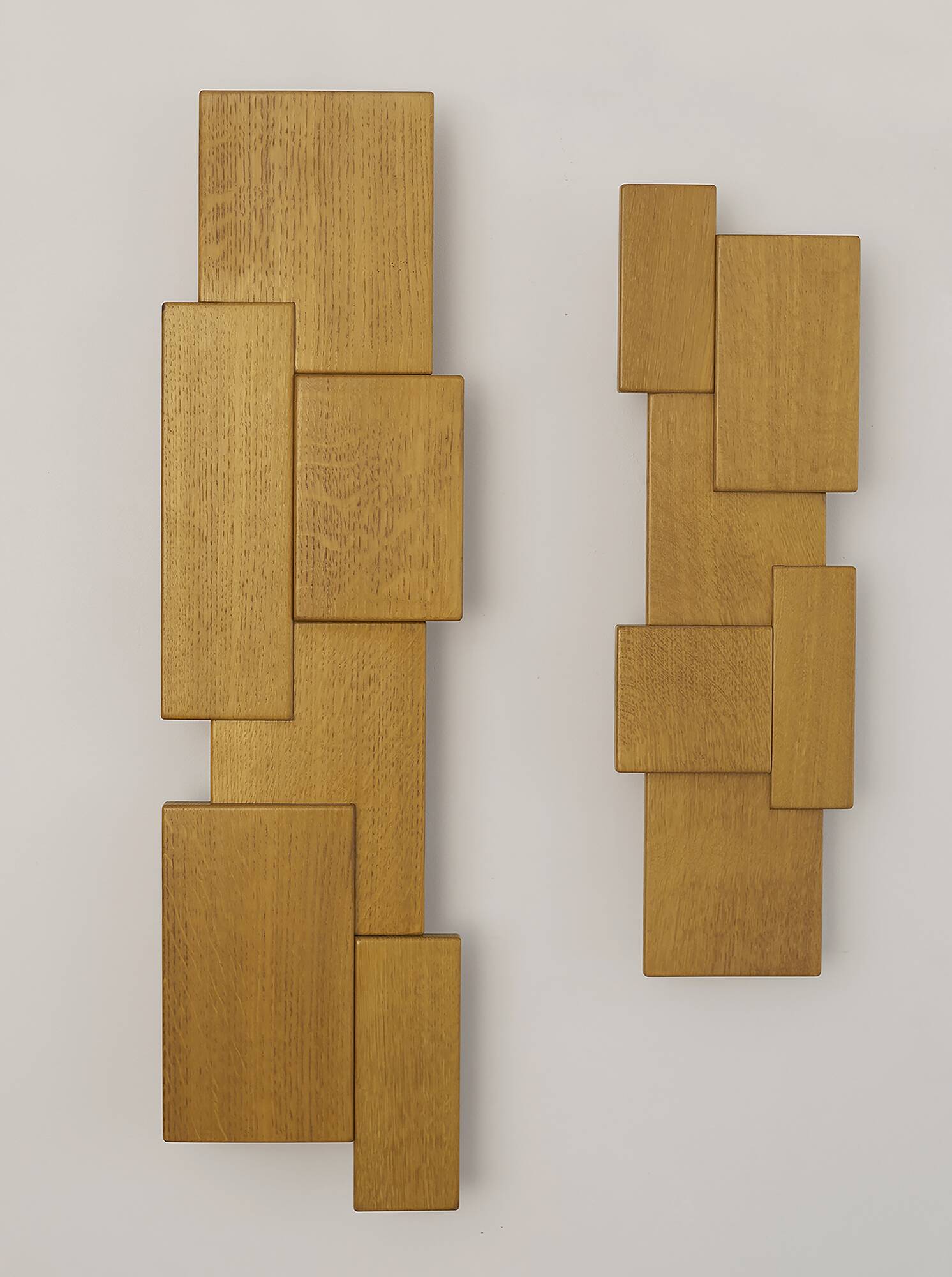 Pair of handcrafted modernist solid oak wall lights, circa 1980