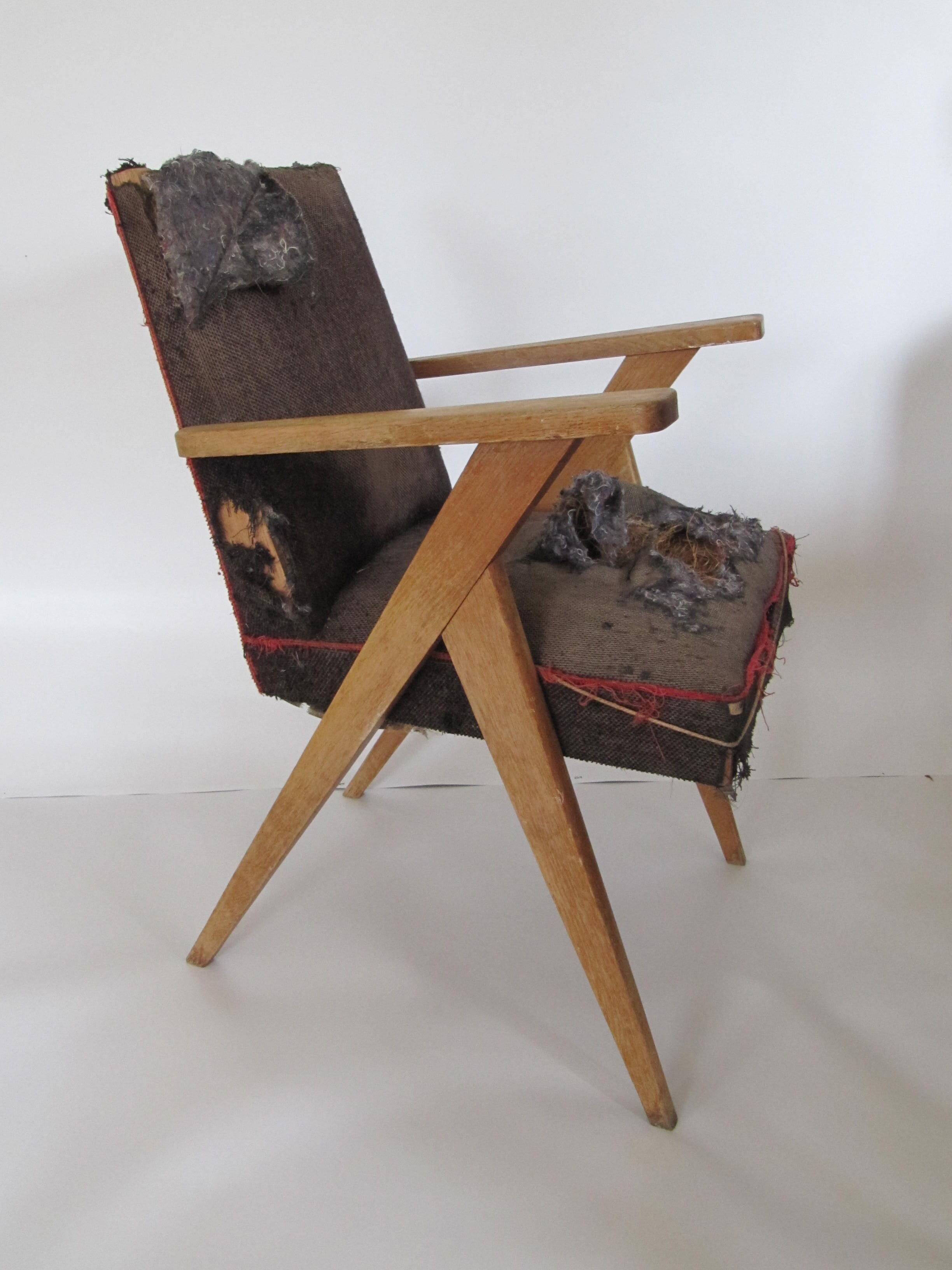 Former Chair restored by an upholsterer the 50 compass