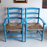 Pair of Provençal armchairs in painted wood and straw, around 1960.