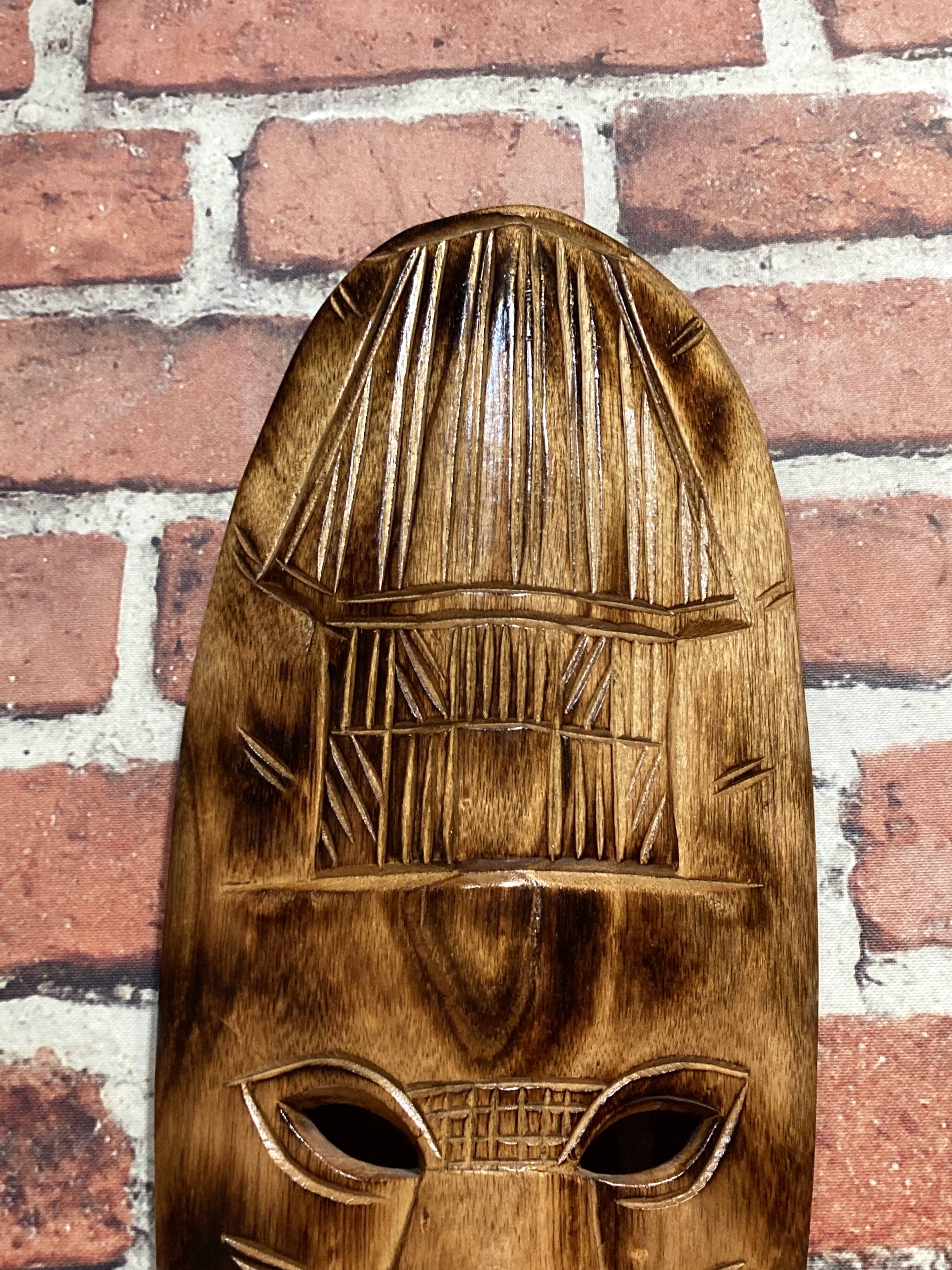Wooden wall mask