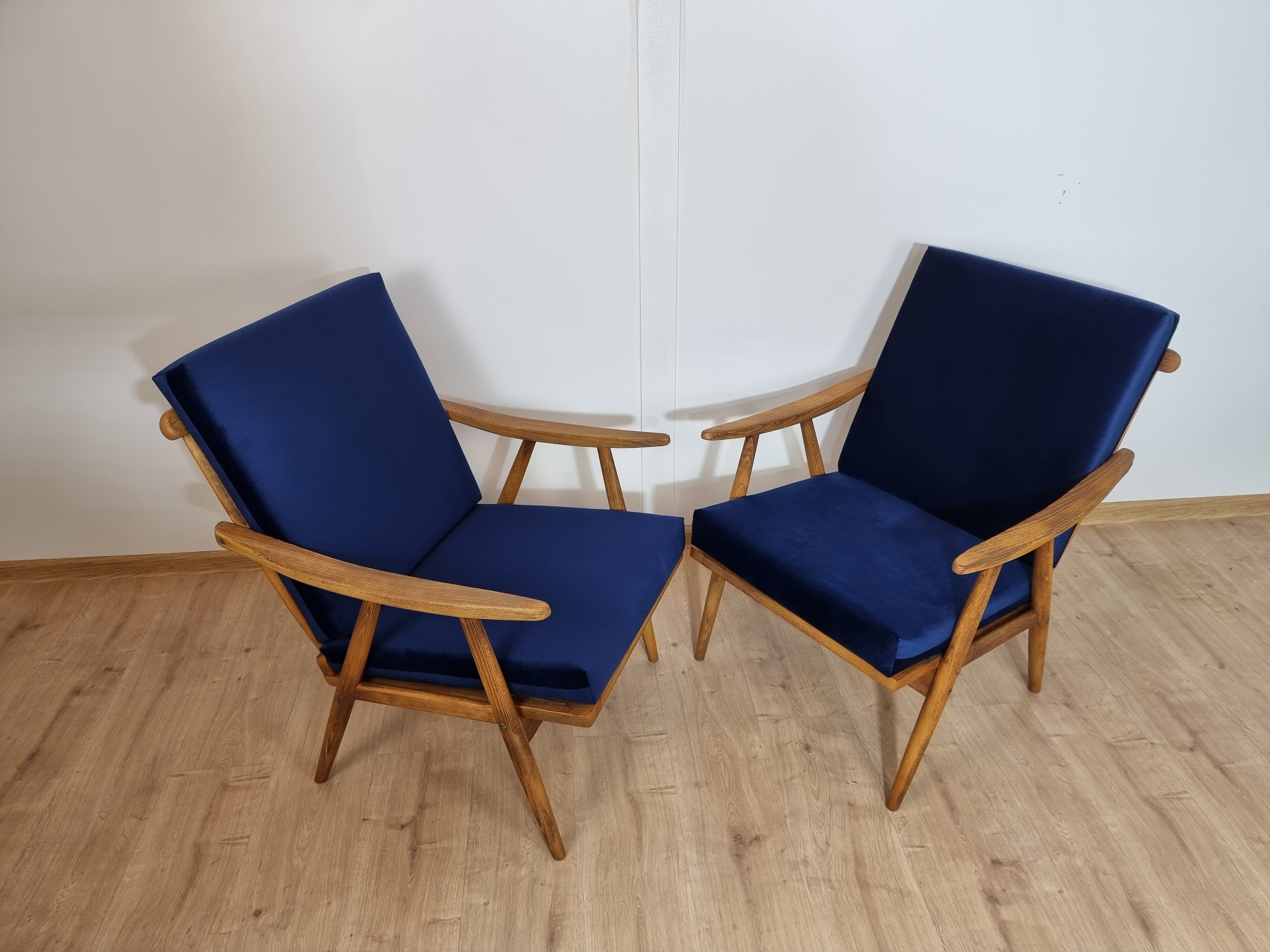Boomerang" model armchairs by Ton