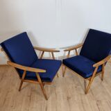 Boomerang" model armchairs by Ton