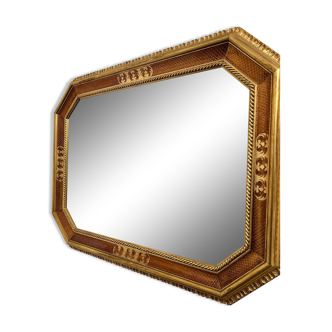 Miroir en bois et stuc doré