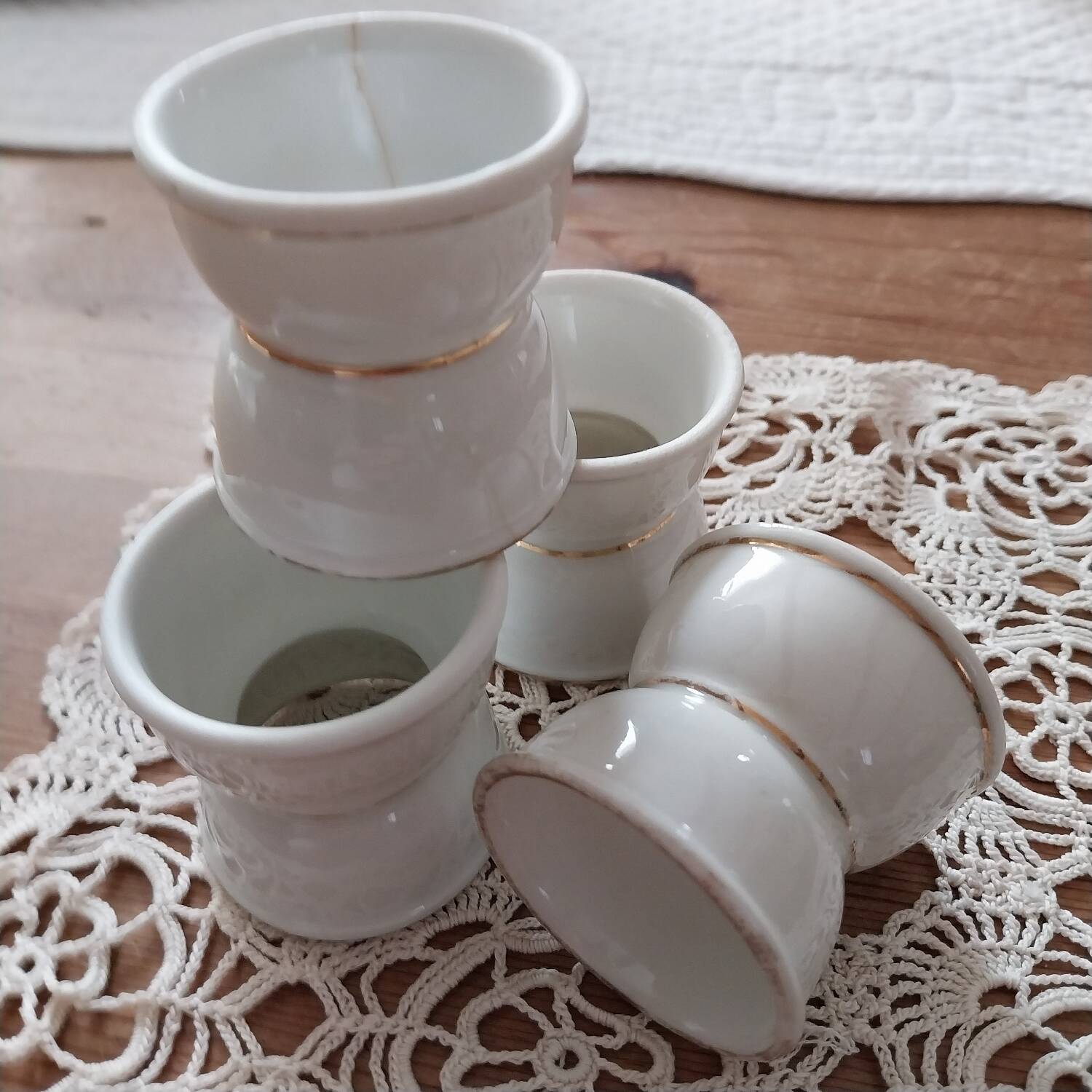 Old white porcelain diabolo egg cups Paris