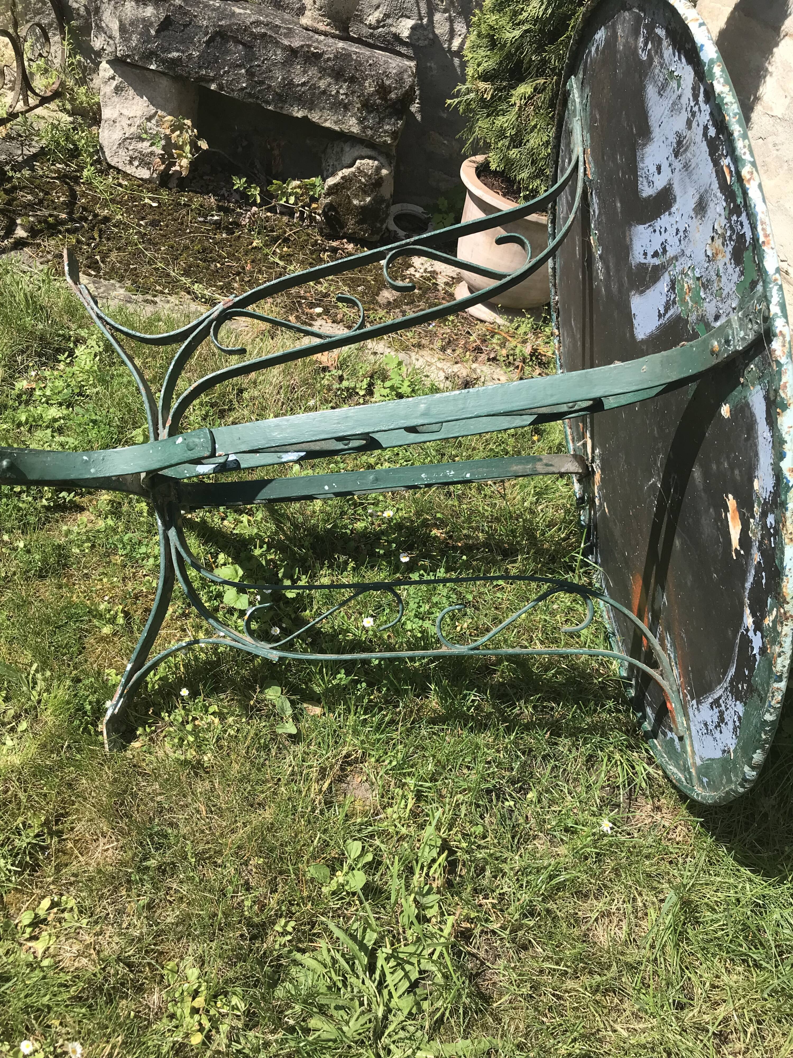 large antique iron table riveted