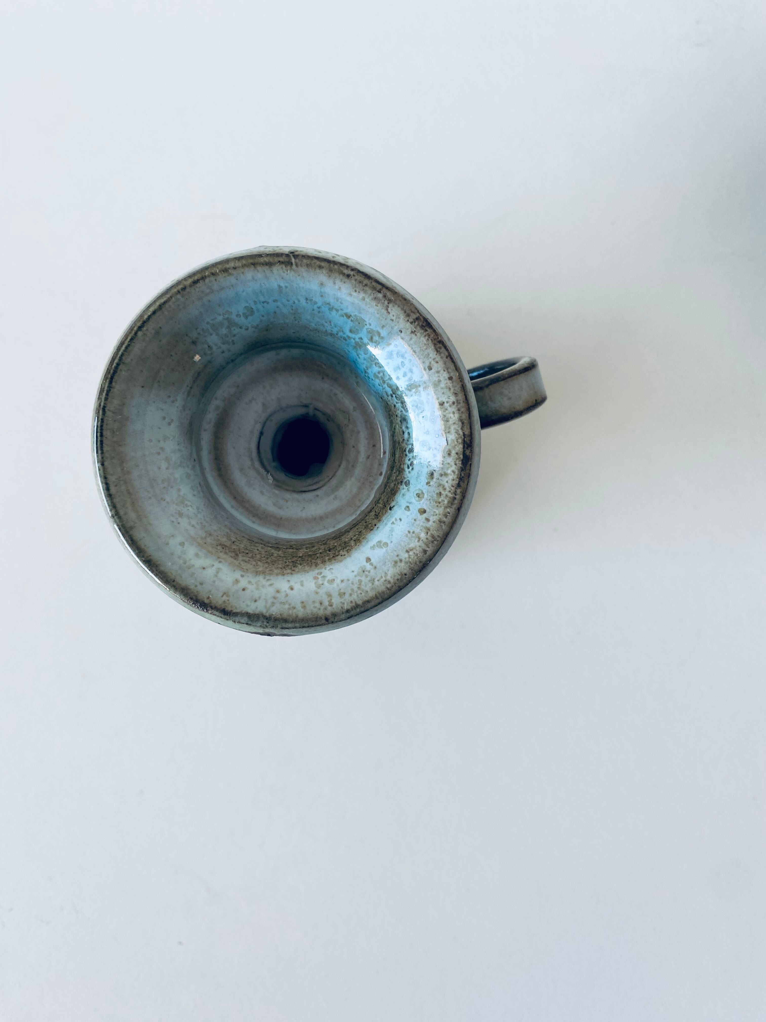 Enamelled ceramic candle holder