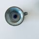Enamelled ceramic candle holder