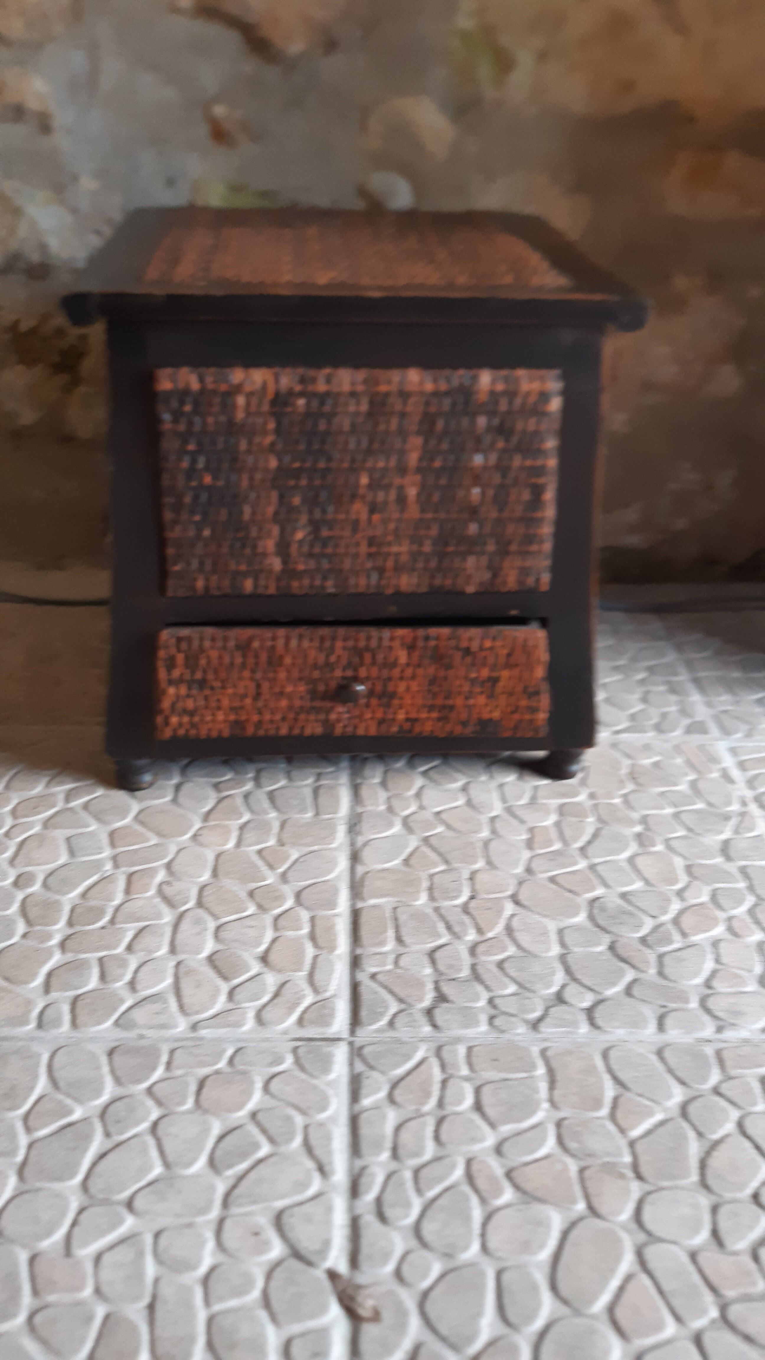 Wooden chest and braided rice straw