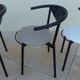 6 gondola-style chairs with a metal structure for indoor and outdoor use.