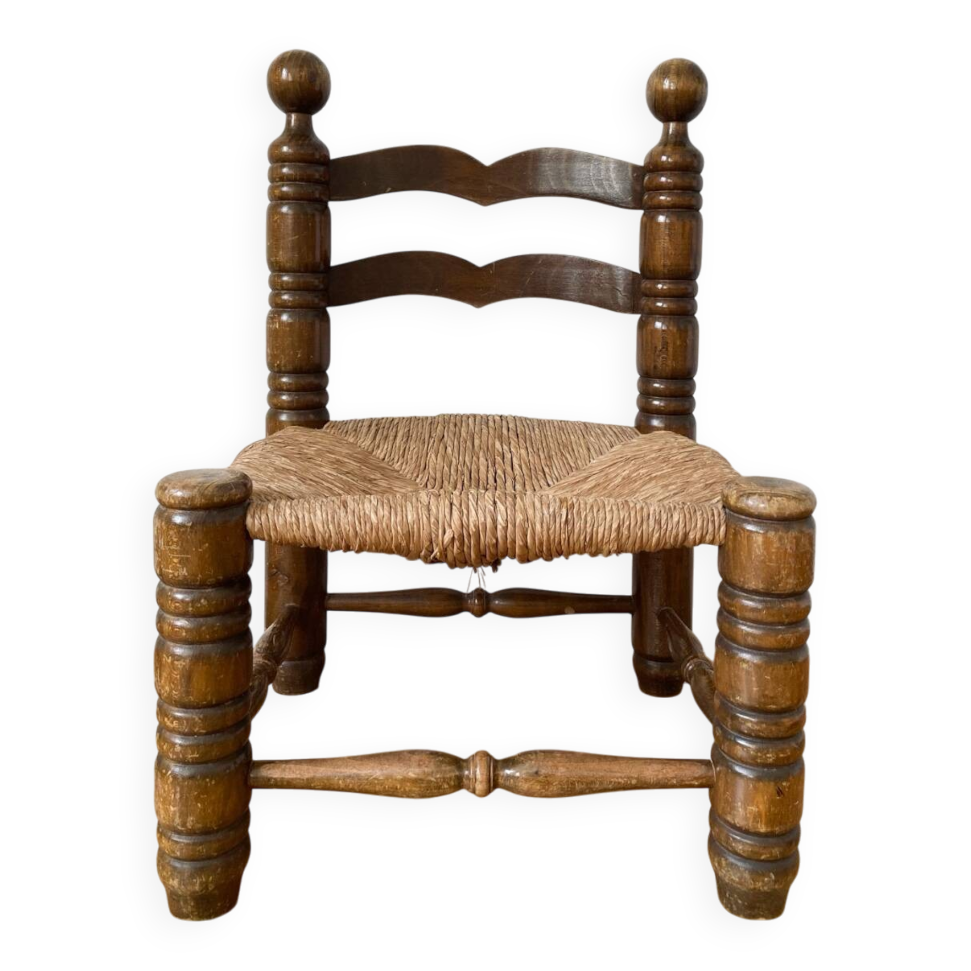 Low fireplace chair in the style of Charles Dudouyt