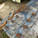 Set of 4 wooden and iron coat hooks from the 60s