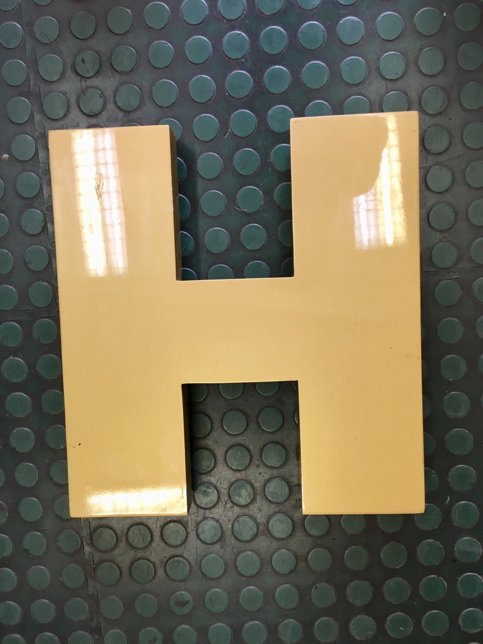 Golden sign letter h