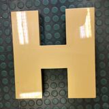Golden sign letter h