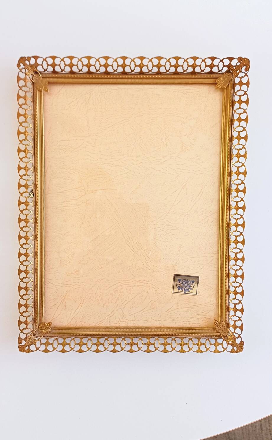 Golden metal frame from the 60s