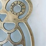 Vintage brass trivet in the shape of an owl