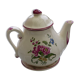 Teapot with saucer