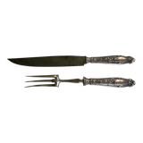 Leg cutlery set. Silver handles.