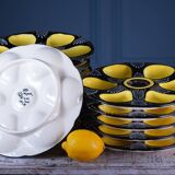 Set of twelve handpainted Brittany yellow, cream and black oyster plates