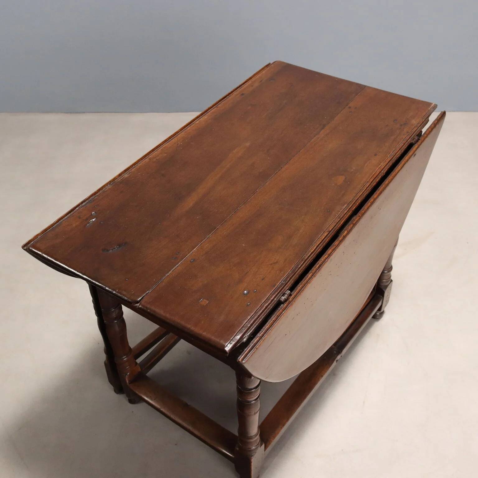 Antique walnut and poplar table, Italy, 18th century.