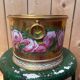 Cache-pot porcelain from Paris, rose decoration on a golden background, Empire style.