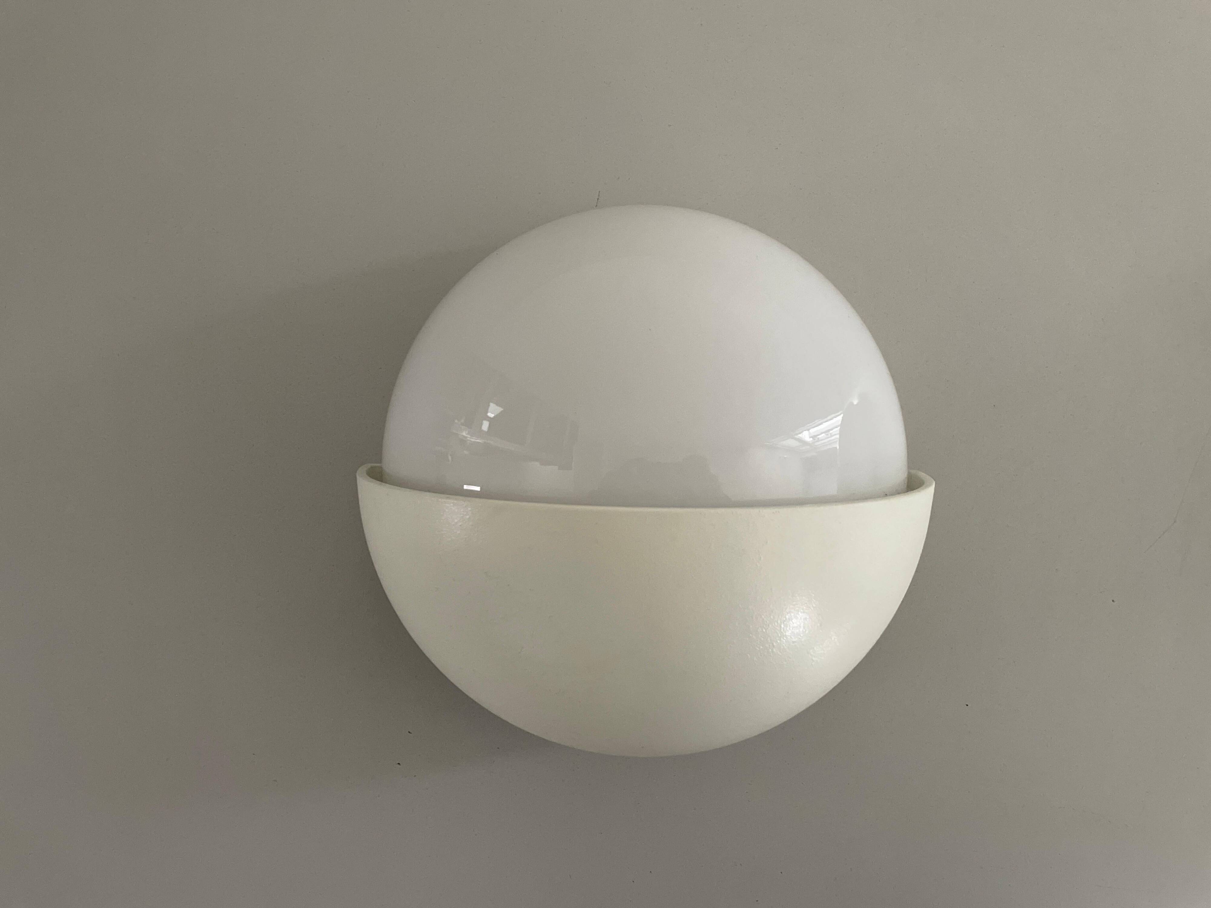 Round wall lights, small and large, in white metal by Bega, 1970s, Germany.