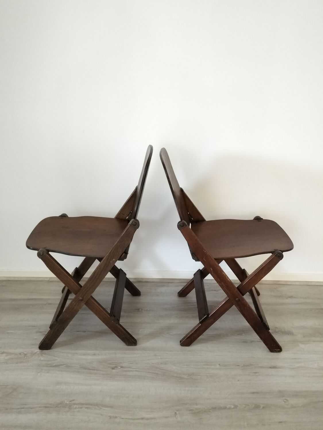 Folding chairs in US armed wood