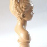 Bust of a young girl in plaster
