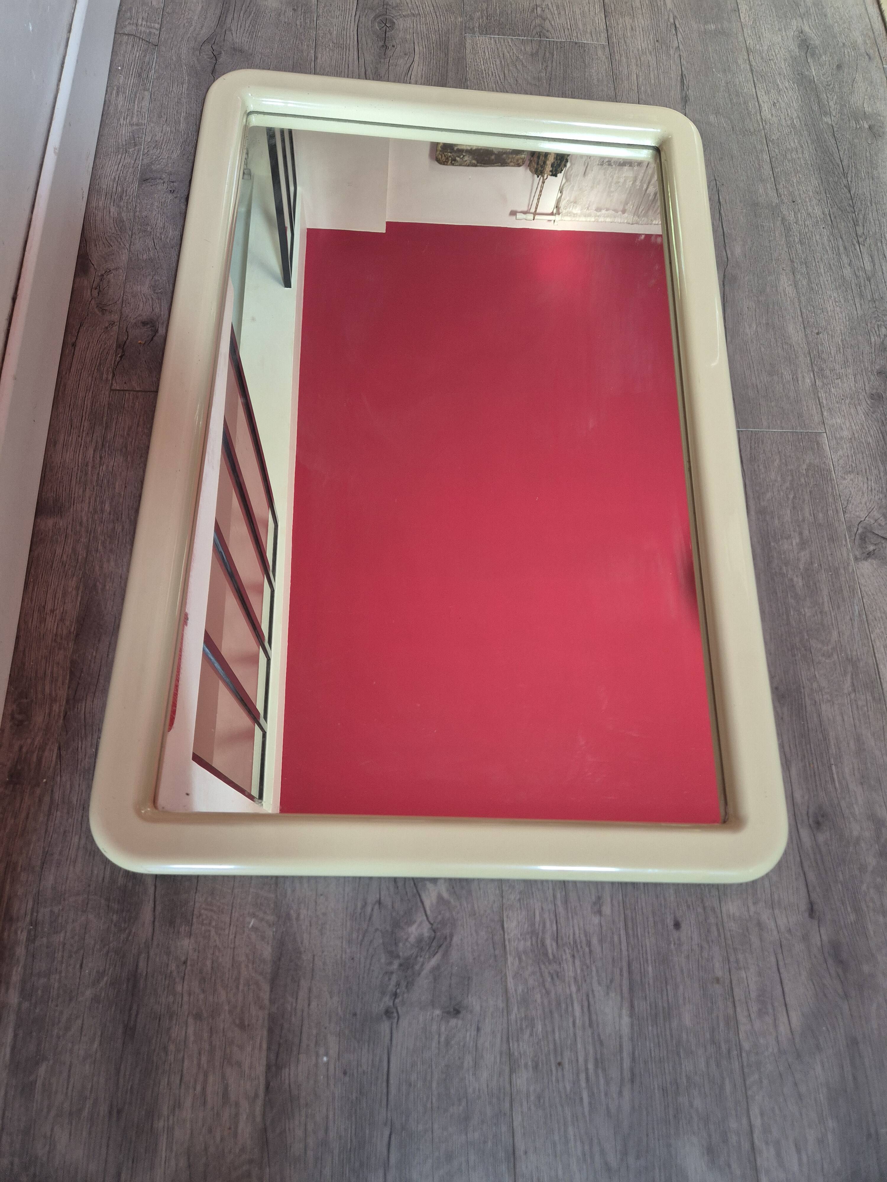 vintage mirror from the 70s with a large beige border, 90 by 60 cm