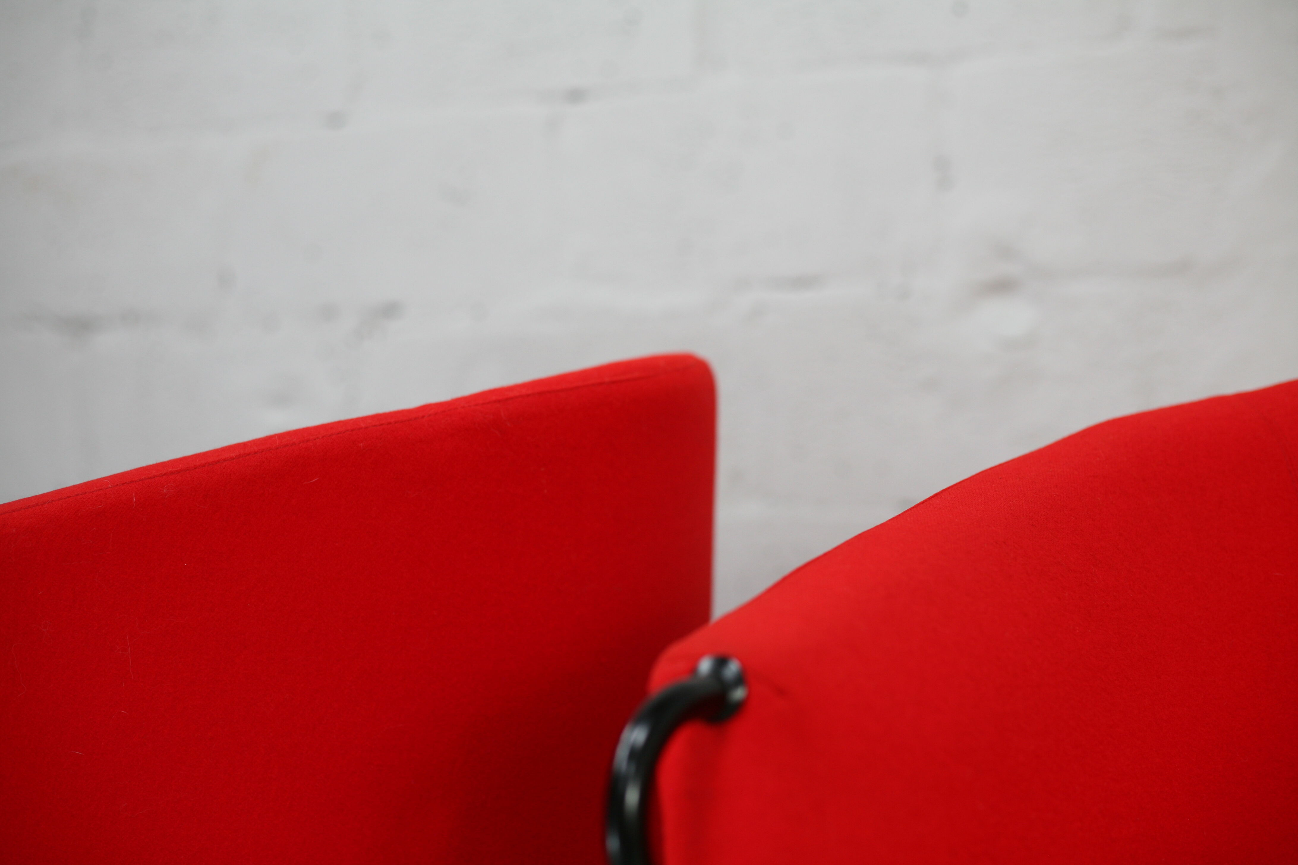 Pair of red Arflex armchairs. Italy, circa 1980