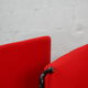Paire de fauteuils Arflex rouges. Italie, circa 1980