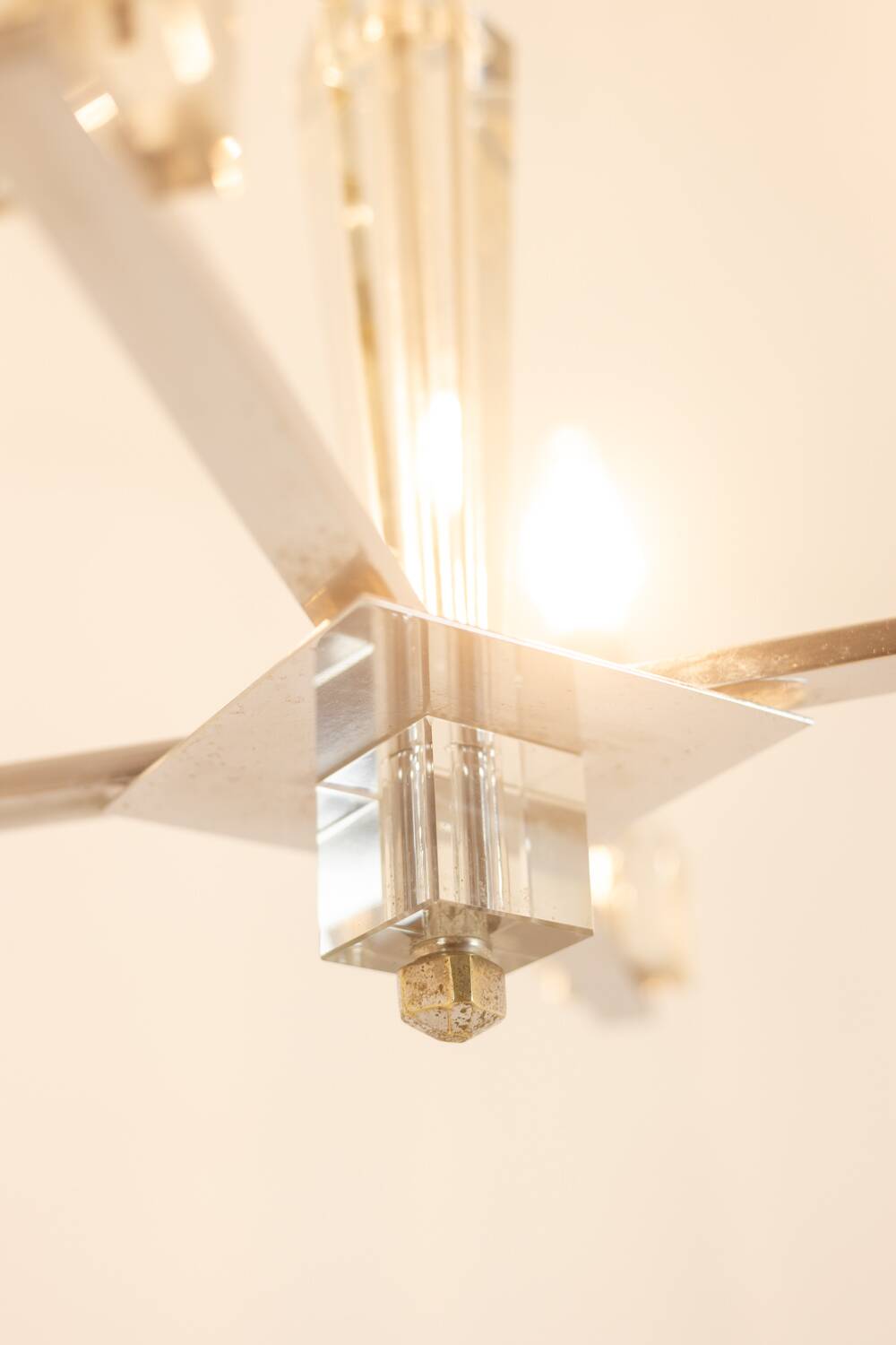 Jacques Adnet. Modernist chandelier in chromed metal. Circa 1940.