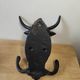 Wall-mounted coat hook in cast iron, bull's head and Camargue cross