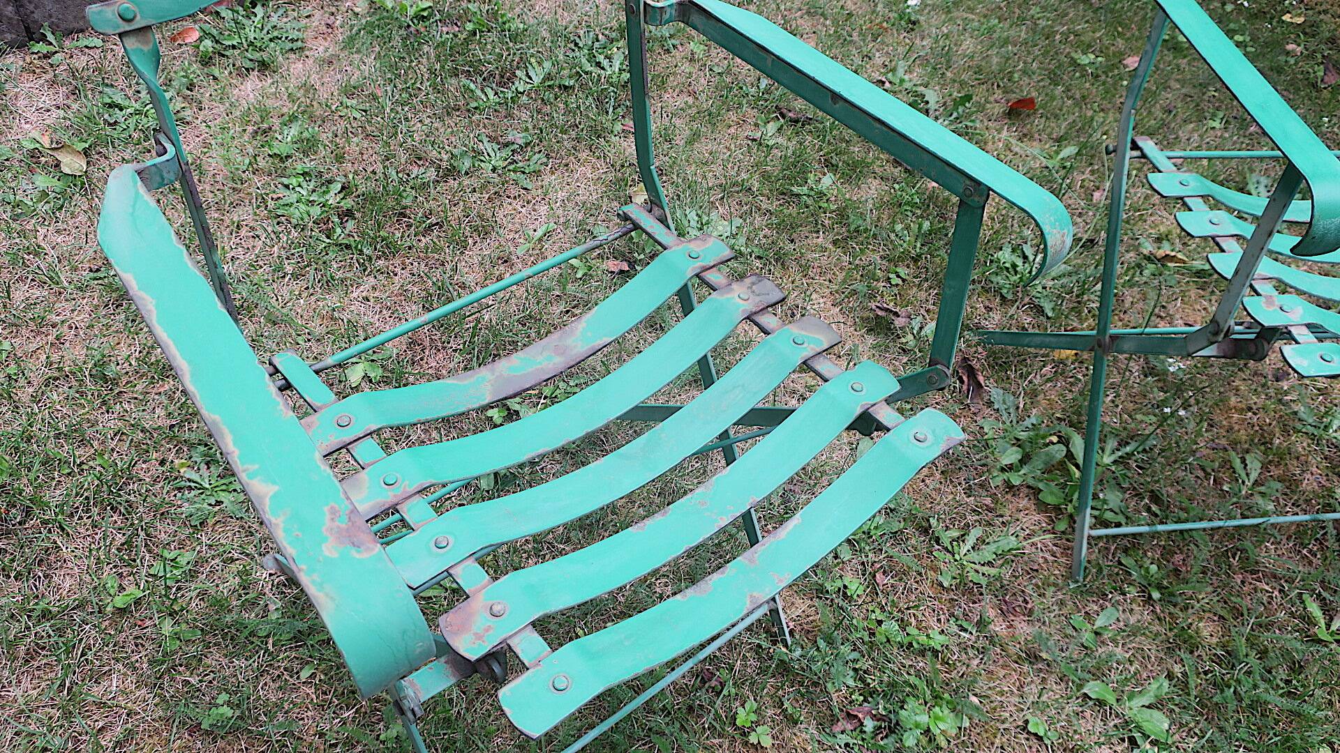 Pair of mid century distressed painted iron garden chairs