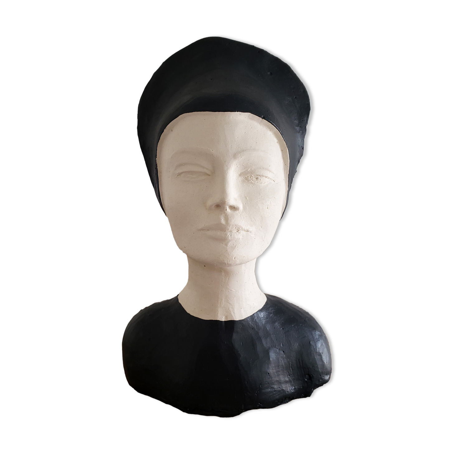 Bust of a woman in anthracite and white plaster