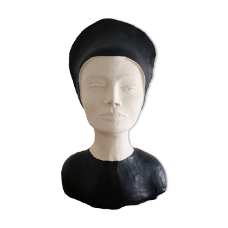 Bust of a woman in anthracite and white plaster