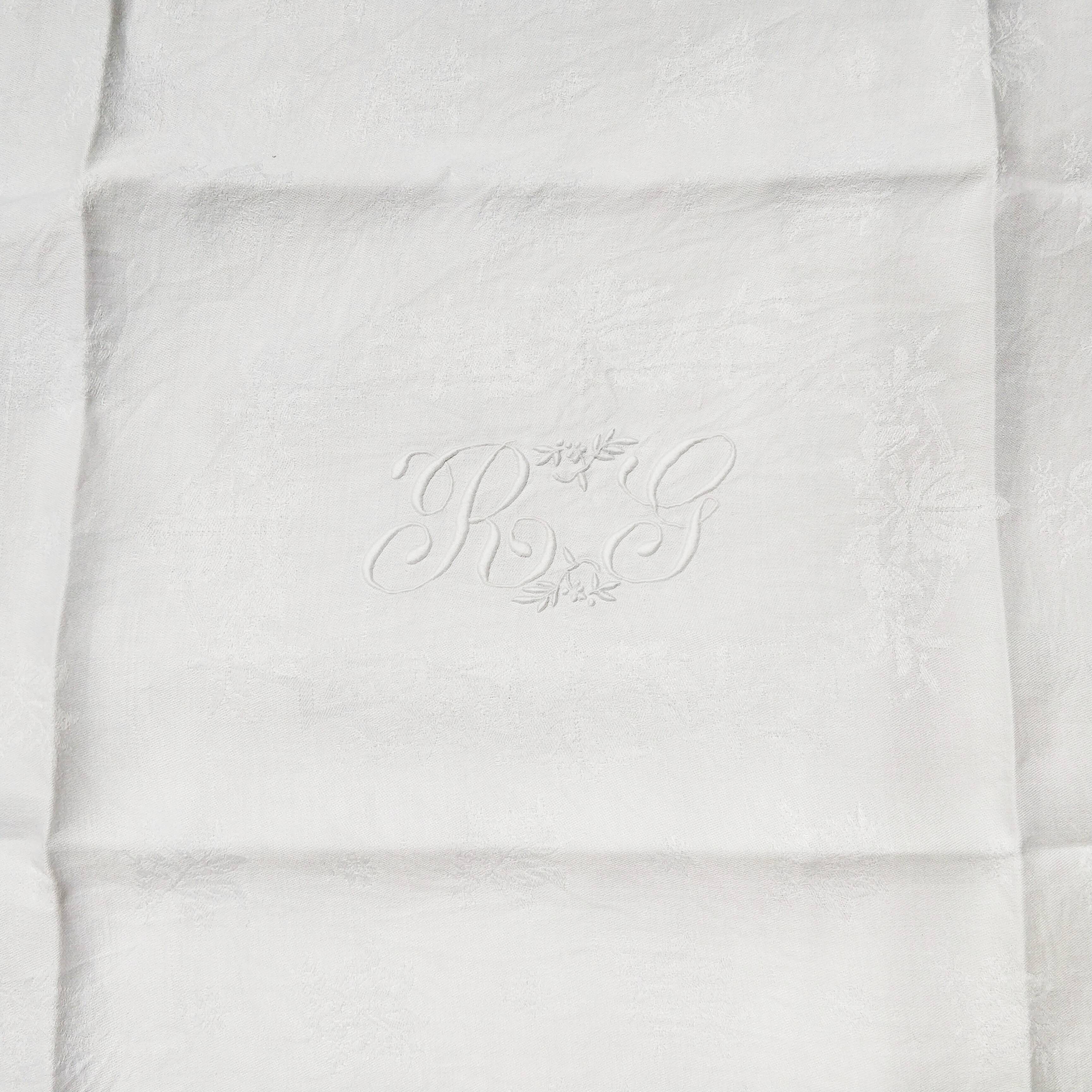 White linen towels embroidered