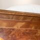 Double bed in Art Deco style with thuya burl wood and two bedside tables.