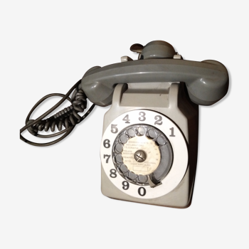 vintage telephone with rotating dial